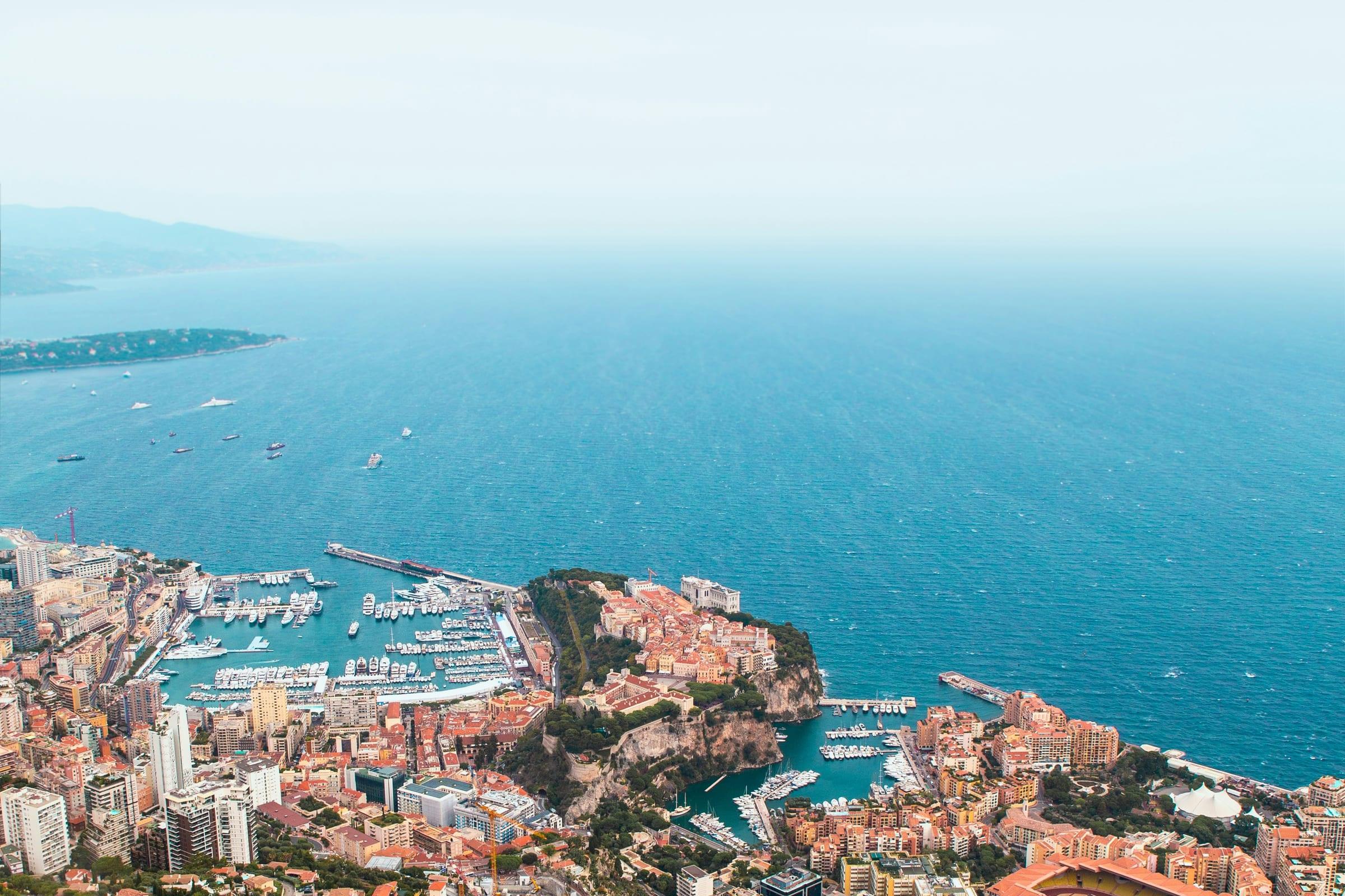 The Monaco coastline from the corniche above, the principality and its harbour below.