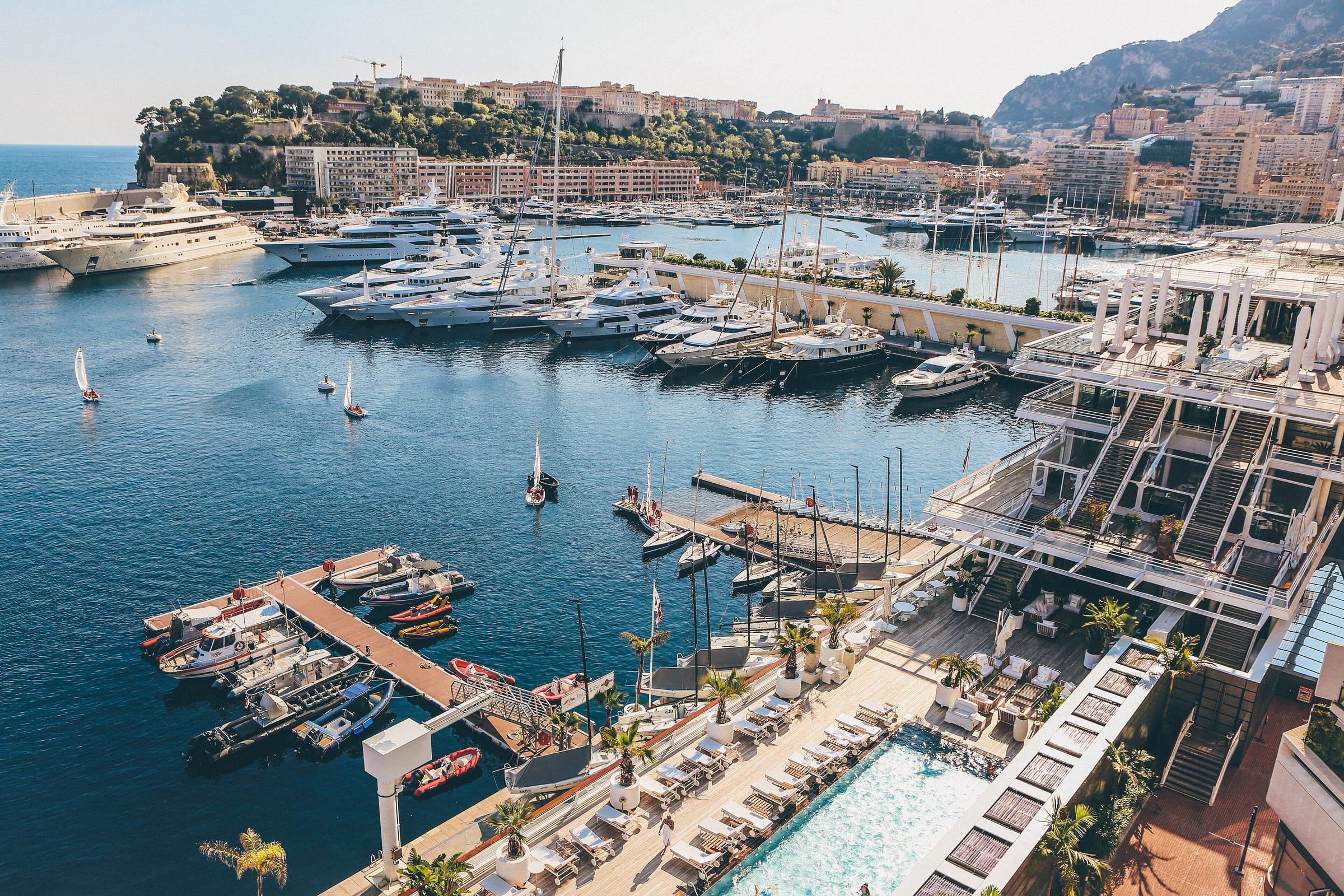 Yachts berthed in Port Hercule, Monaco, seen from above in spring.